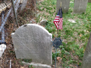 The grave of Robert Townsend, Fort Hill Cemetery, with Sons of American Revolution medal.